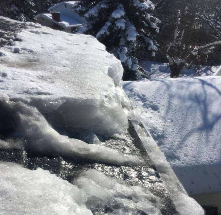 Ice Damn on roof in calgary