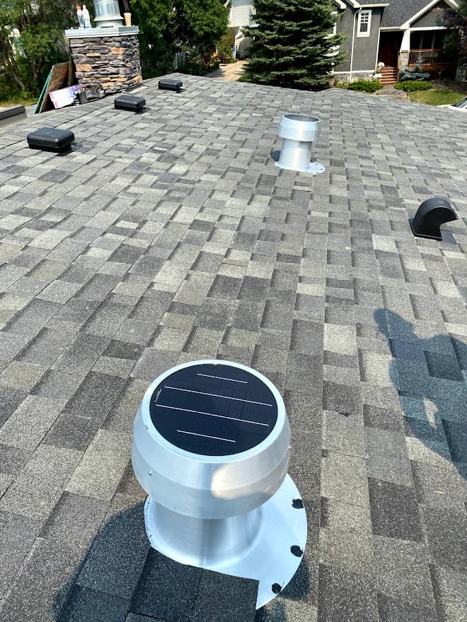 Roofing system components such as vents on a roof in calgary